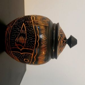 A Unique vintage ornate hand carved wood jar, a lidden fish,a tropical flower.
